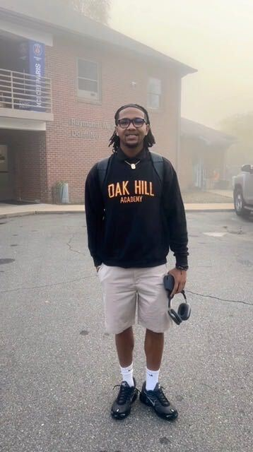 Daric Ebanks, grant recipient, standing outside a campus building.